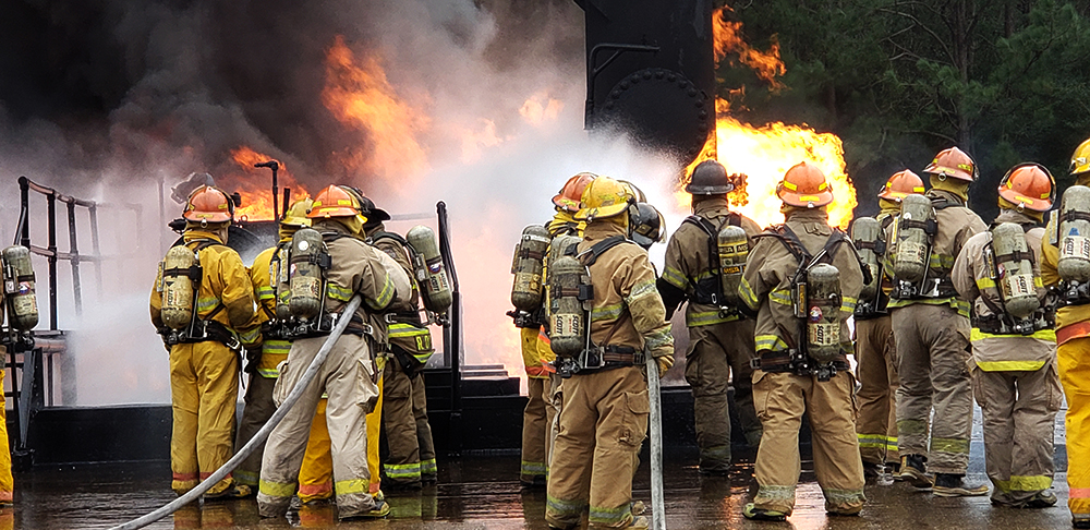 Firefighters fight industrial blaze outside