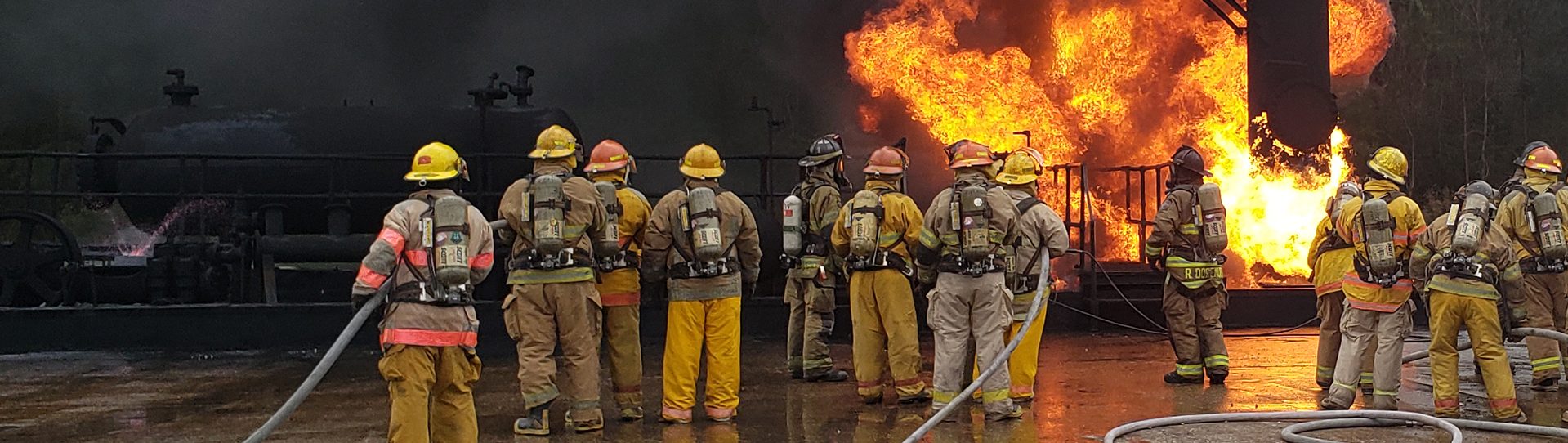 Firefighters fight industrial blaze outside
